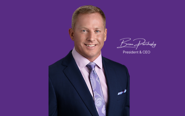 A professional headshot of a smiling man in a blue suit and tie, with a purple background. text overlay identifies him as "brian purchady, president & ceo.