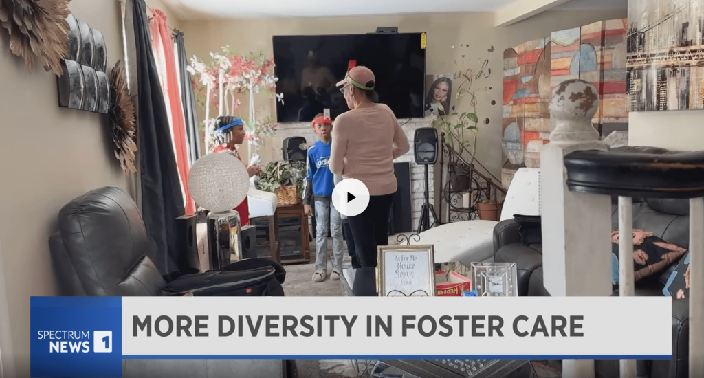 Video Thumbnail with headline reading "More Diversity in Foster Care." A foster parent and several foster children are seen in the background.